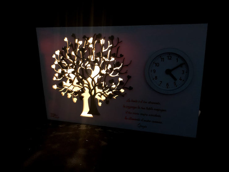 Orologio con albero della vita illuminato, Inciso.